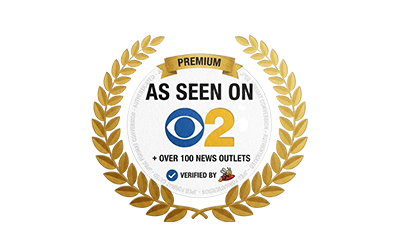 Premium badge with CBS 2 logo and verification statement.