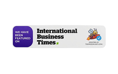 International Business Times logo with a colorful graphic and text.